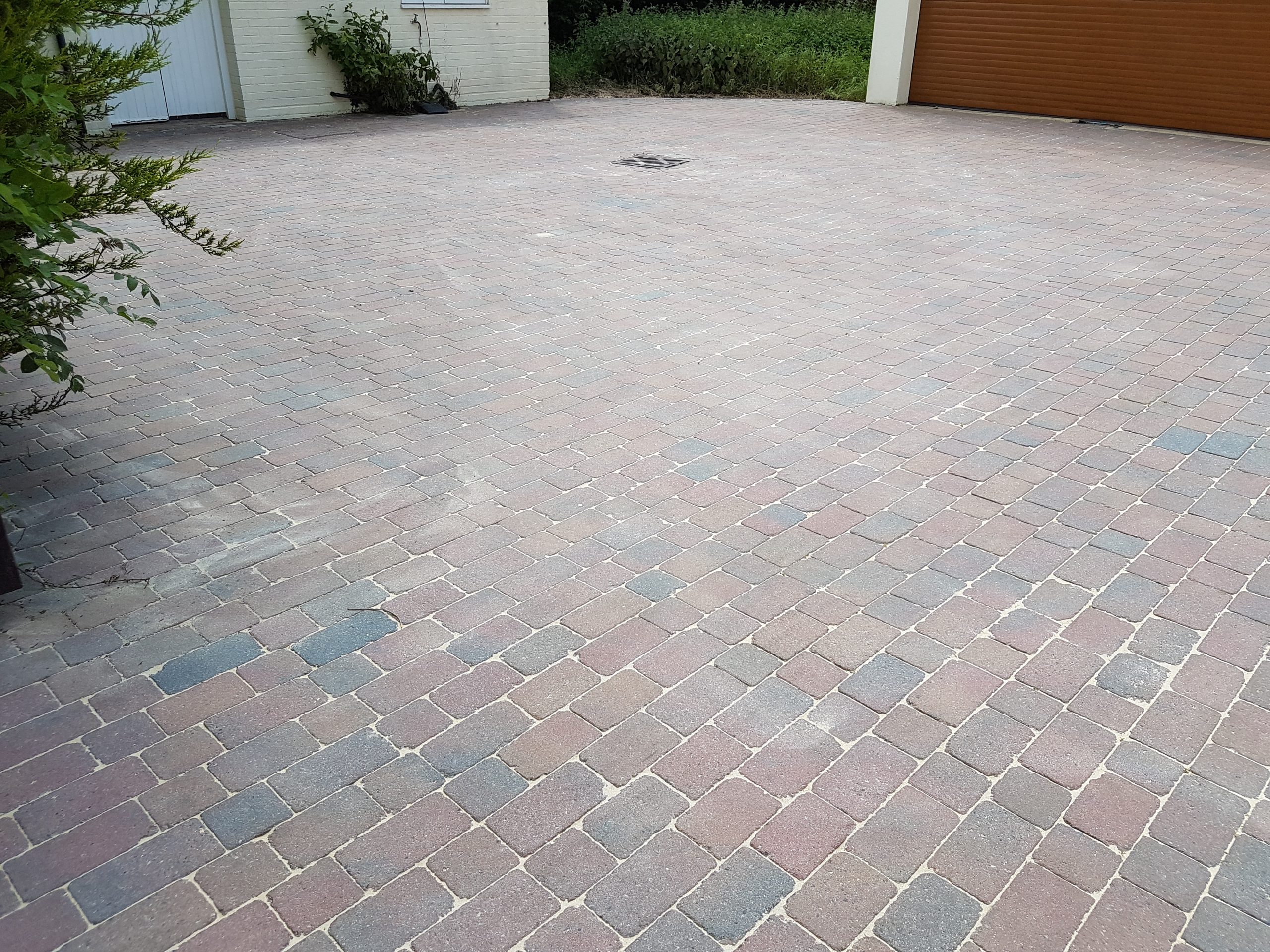 Clean block-paved driveway after cleaning