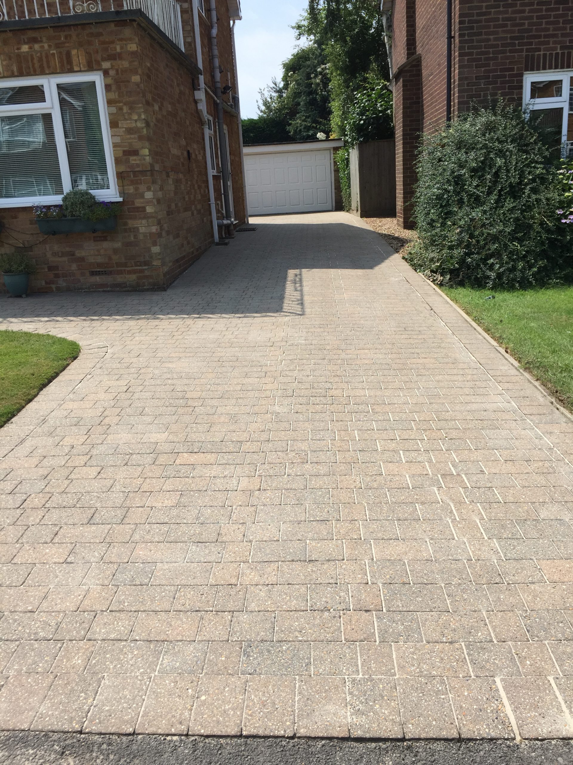 Clean block-paved driveway after cleaning