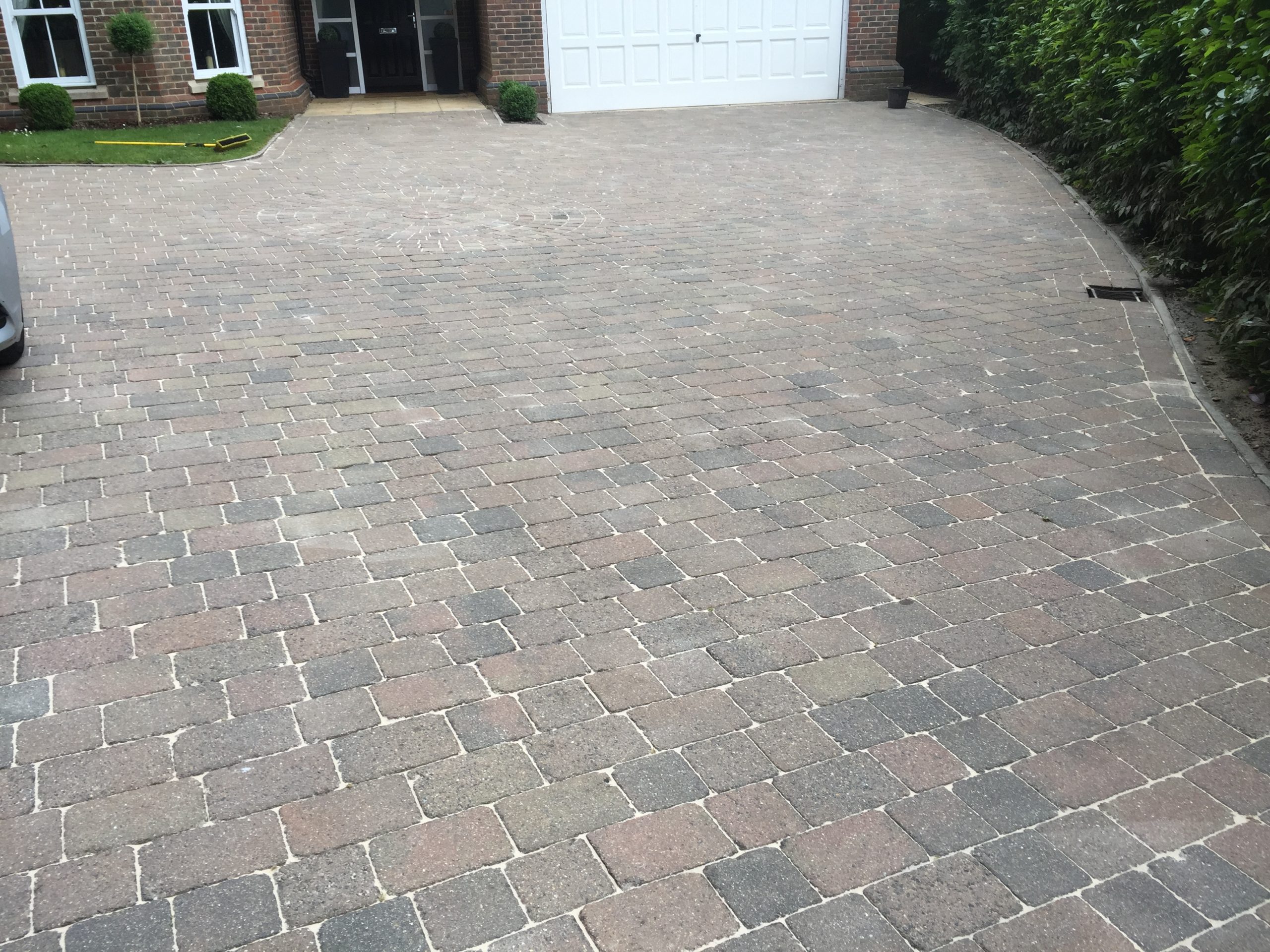 Clean block-paved driveway after cleaning