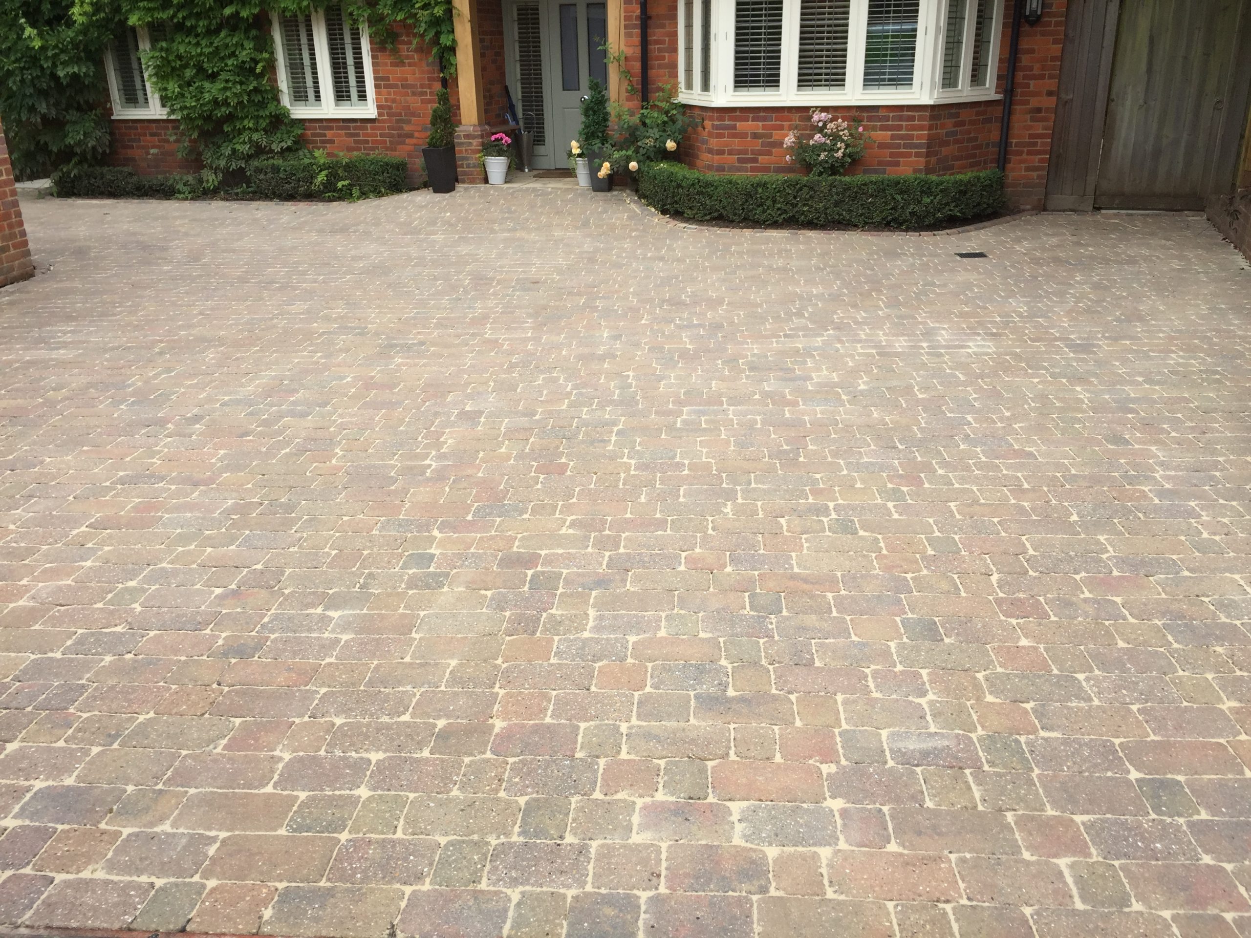 Clean block-paved driveway after cleaning