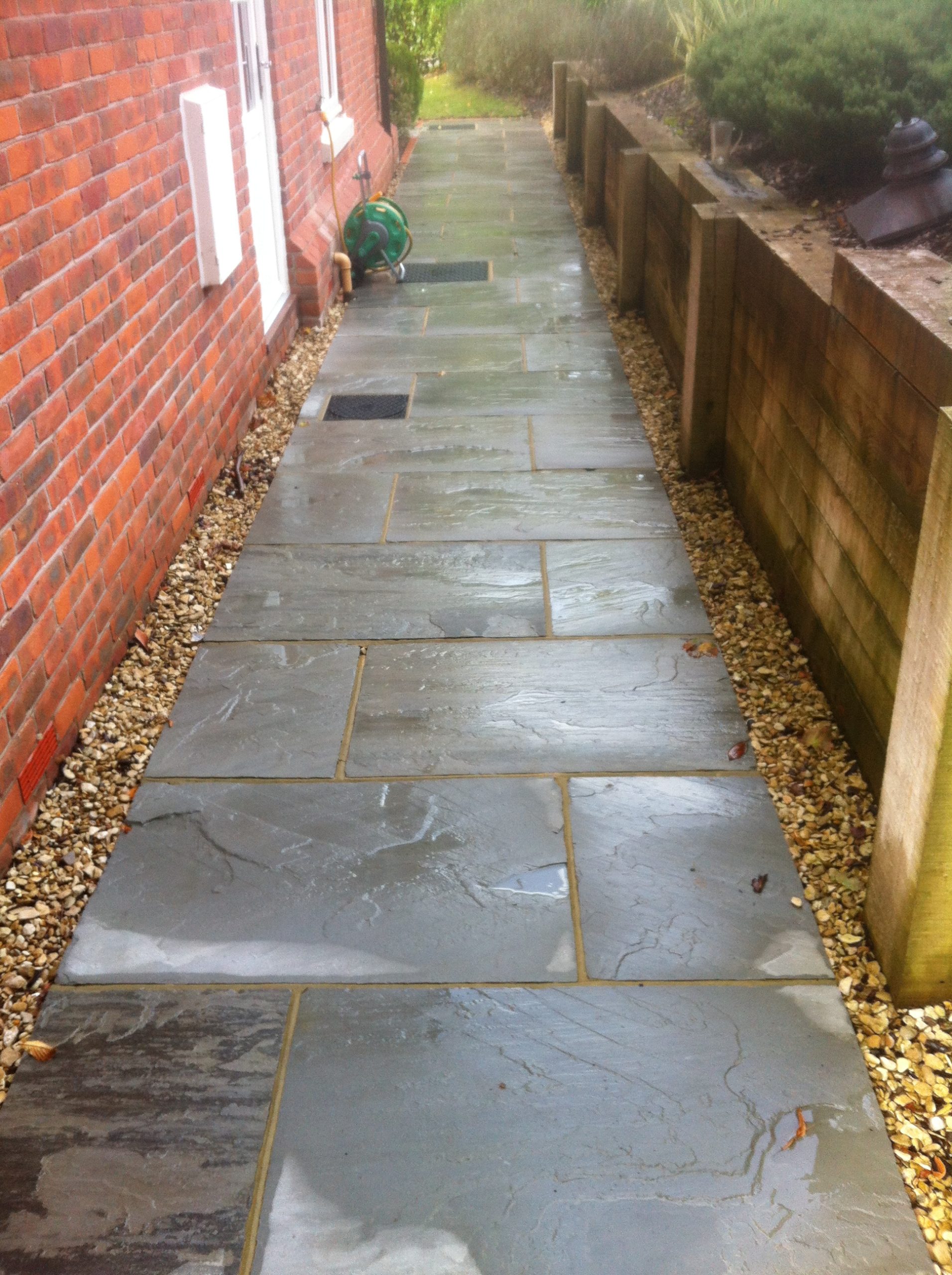 Clean patio garden wall after cleaning