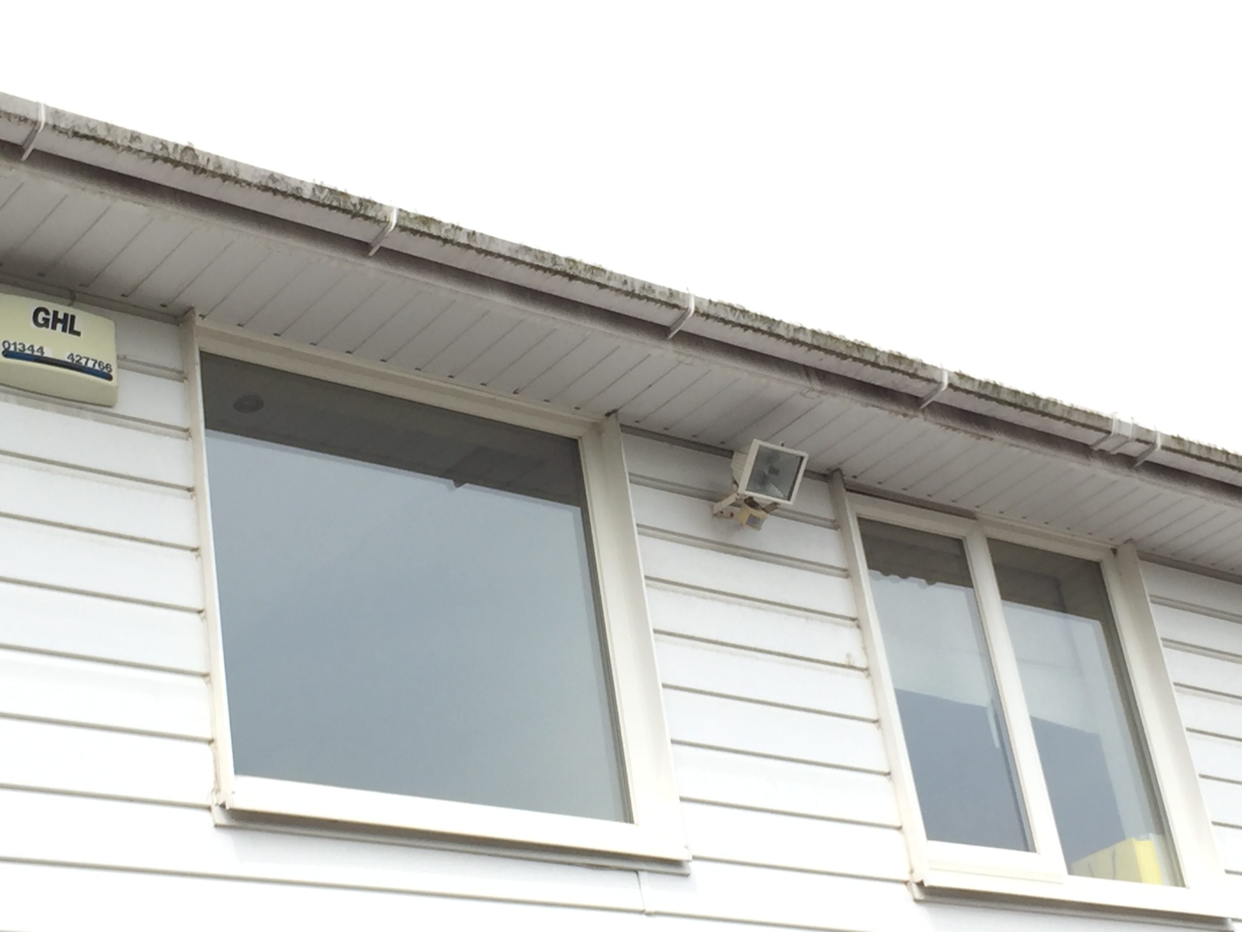 Dirty fascia board before cleaning