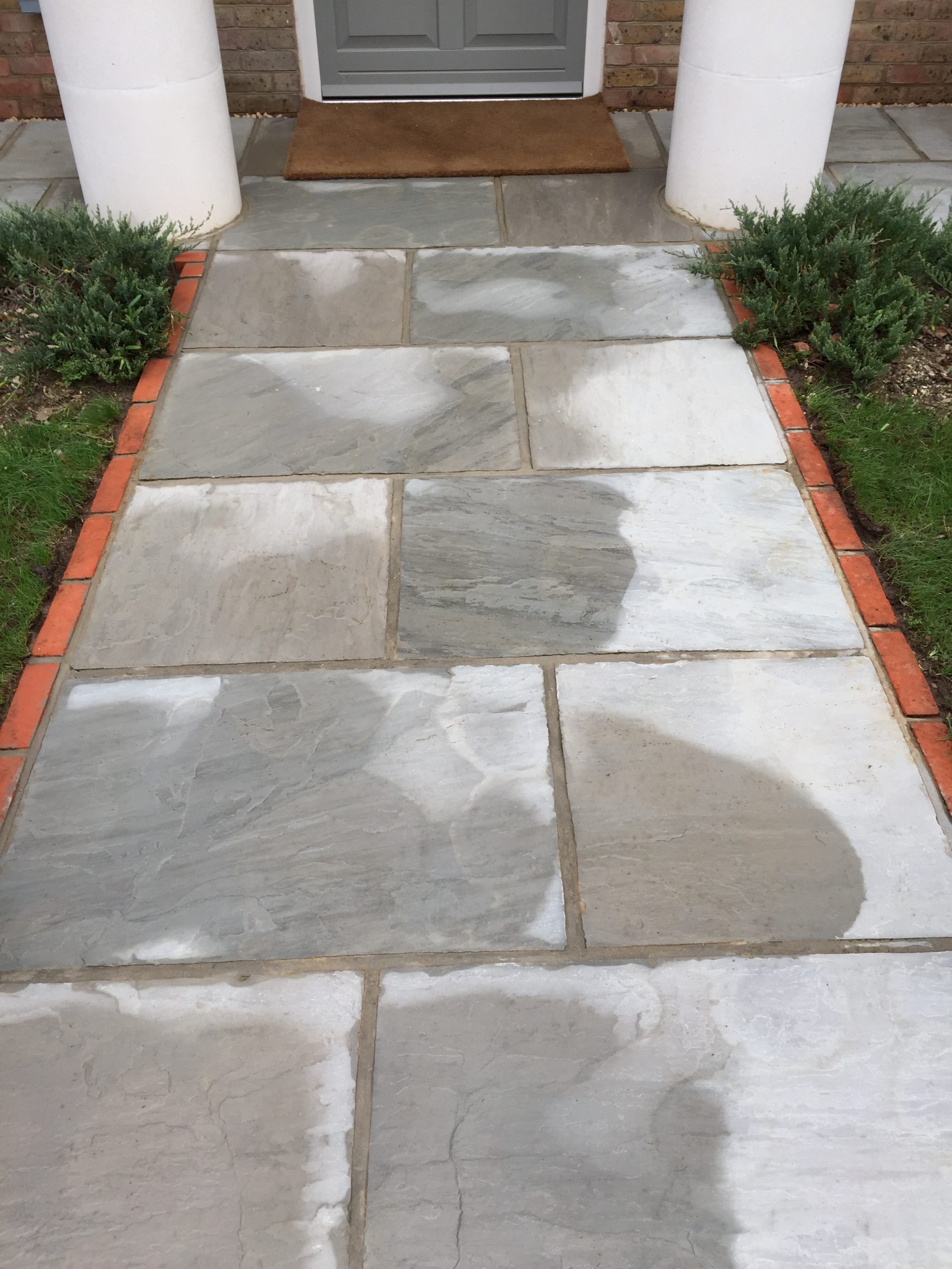 Clean sandstone patio path after cleaning