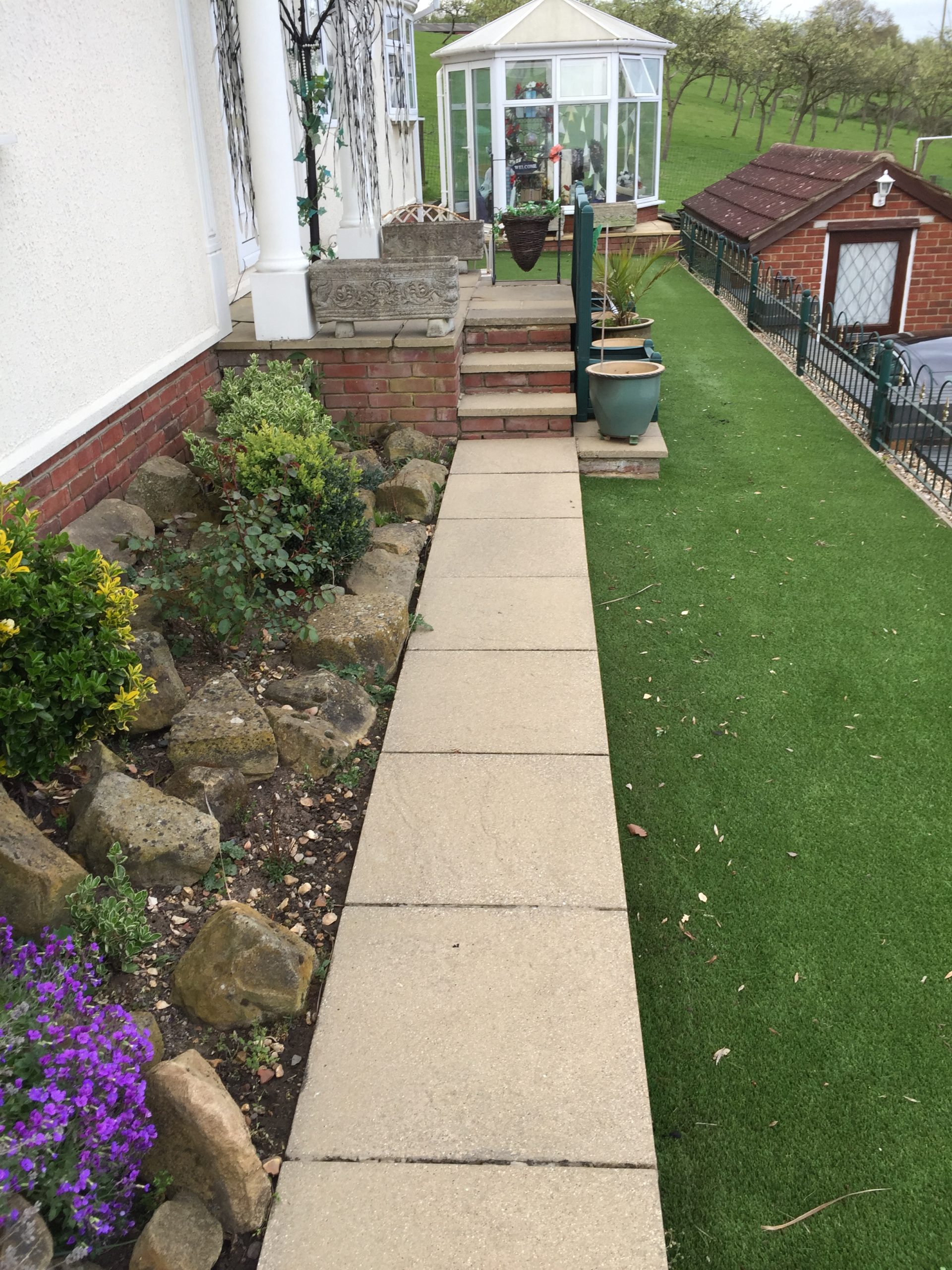 Clean patio garden wall after cleaning