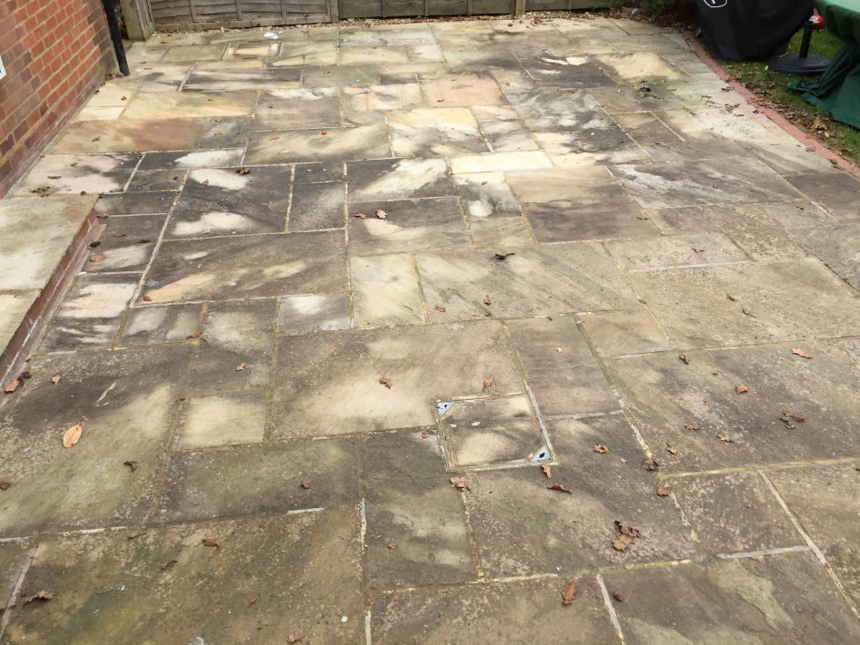 Dirty patio before cleaning